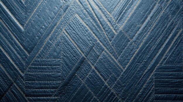 Detailed blue geometric pattern of quilted fabric shows intricate stitching and unique design, perfect for textile arts projects or background textures in design work. photo