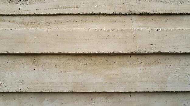 Close up of a concrete wall with horizontal lines showing texture and variation in color and structure. photo