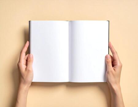 Hands are holding open blank notebook on soft background for writing photo