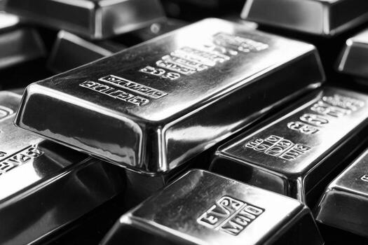 Macro picture of silver bars. The silver bars are stacked on top of each other. Investment concept photo