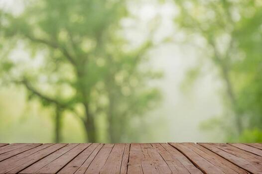 Abstract summer green blur nature background with wooden floor copy space for text photo