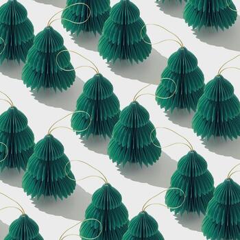 Minimal pattern of green paper Christmas ornaments shaped fie tree on white, style holidays design. Festive texture backdrop of paper Honeycomb baubles. Merry Christmas and Happy New Year concept. photo