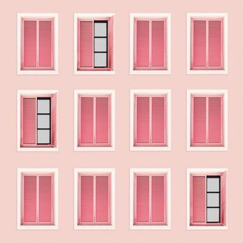 Minimal summer aesthetic pattern from pink shutter windows on pastel pink wall, abstract three-story building. Natural sunlight, modern design. Concept of summer, vacation, tropical style architecture photo