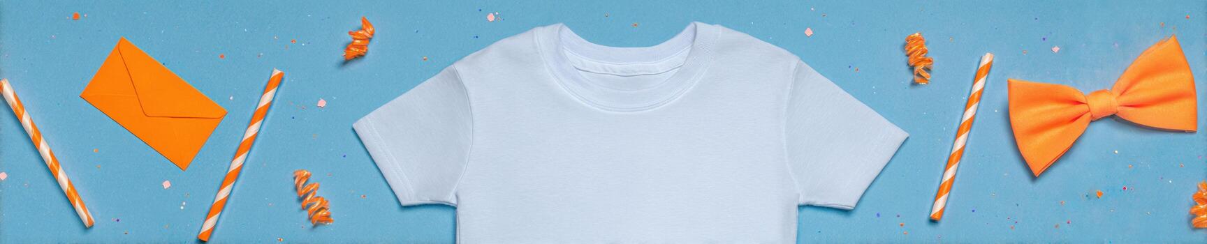 Minimalistic flat lay of plain t shirt with colorful party decorations on blue background photo