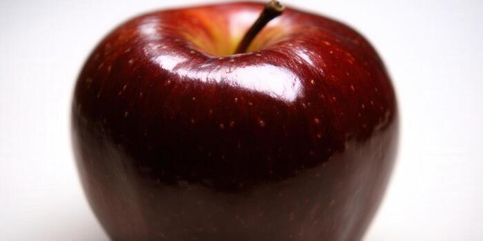 A stunning close-up of a perfectly ripe, red apple, ready to eat. photo