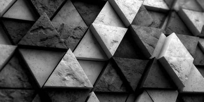 Geometric triangle pattern forming a textured, modern abstract background. photo