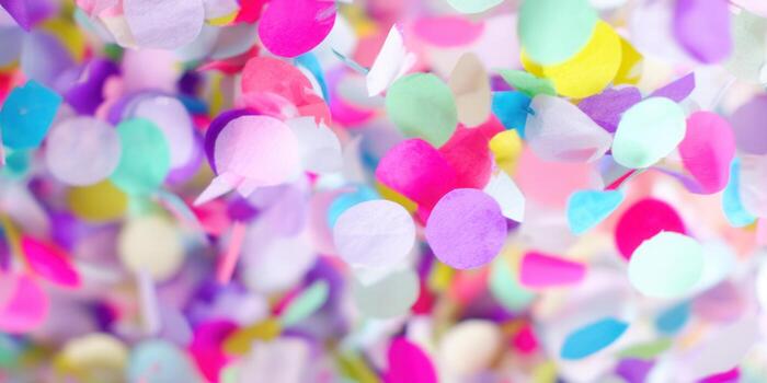 Vibrant confetti falling, creating a cheerful and celebratory atmosphere for any joyous event. photo
