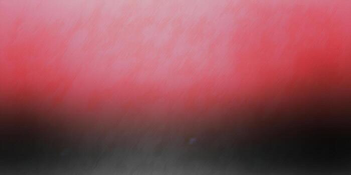 This abstract background showcases a smooth gradient of rich red and deep black hues. photo