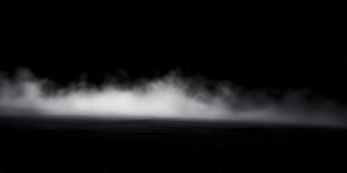 Ethereal mist hovers over a dark, shadowy landscape, creating a dramatic, atmospheric scene. photo