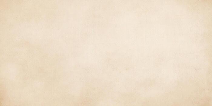 A textured beige paper background creates a blank canvas for your design. photo