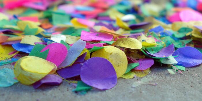Colorful confetti scattered on a surface, perfect for celebrations and adding a festive touch. photo