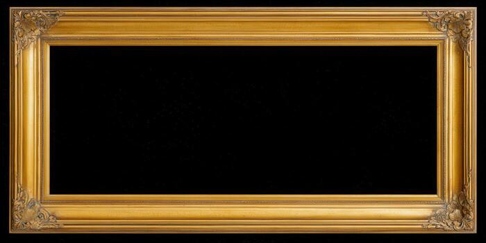 A beautifully crafted golden frame with an empty black space within. photo