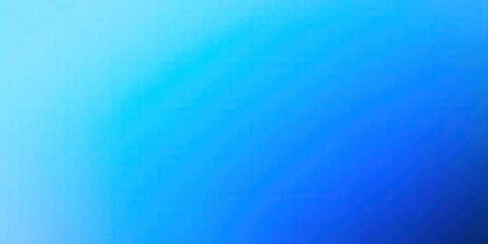 A mesmerizing blue gradient background showcasing a blend of vibrant hues and smooth textures. photo