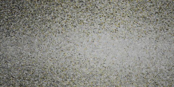 A detailed view highlights a textured surface with a mix of subtle grey and yellow hues. photo