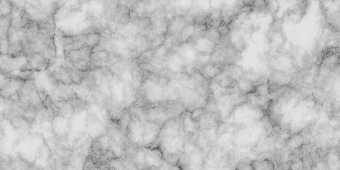 A beautiful and elegant white marble texture with intricate gray veining, perfect for backgrounds. photo