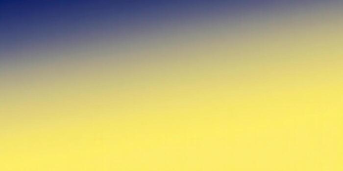 A seamless gradient from blue to yellow creates a vibrant background. photo