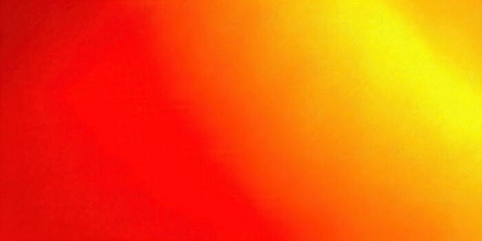 This vibrant abstract gradient transitions seamlessly from red to yellow and orange. photo
