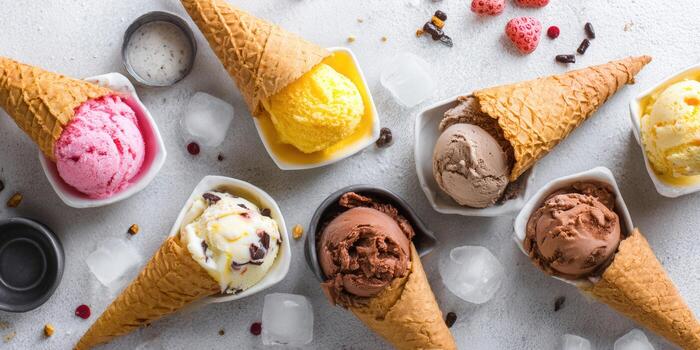 An enticing array of ice cream cones with varied flavors, perfect for a summer treat photo