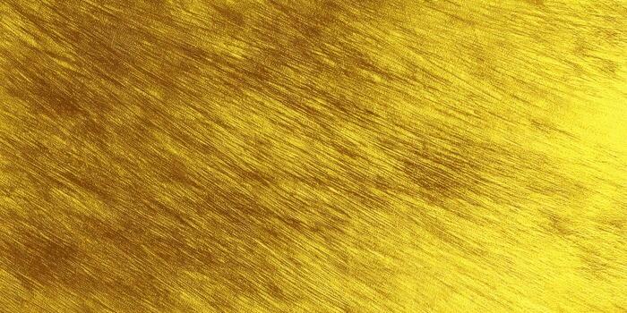 An elegant golden texture with brush stroke details creates a stunning background. photo