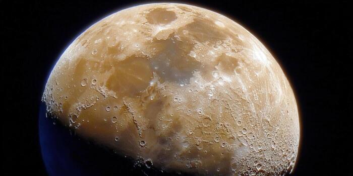 A striking view of the moon's surface reveals its textured details in space. photo