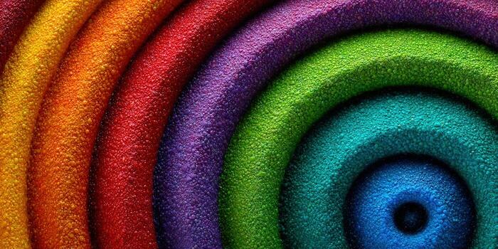 brillante y texturizado concéntrico círculos crear un vistoso y dinámica resumen diseño. foto