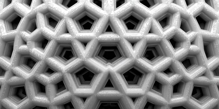 An abstract pattern featuring overlapping geometric shapes in various shades of gray, with an intricate design. photo