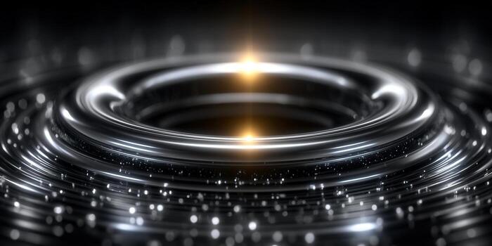 A sleek, metallic ring illuminated by a bright light, set against a dark background. photo