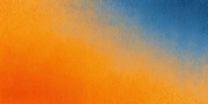 A striking abstract gradient backdrop with warm orange and cool blue tones and a textured surface. photo