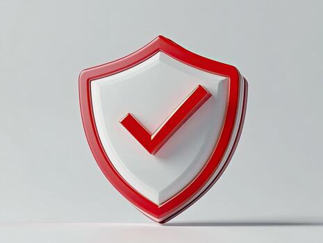 A red and white shield with a tick mark on it. photo