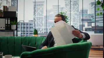 Overburdened director dealing with workload and financial instability, struggling to keep his business economy on the line. Unsuccessful anxious man feeling hopeless due to problems. Camera A. video