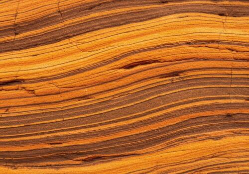 A close up of a rock wall with a wavy pattern photo