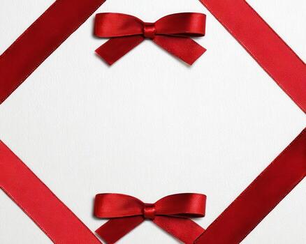 Red ribbon satin bow white background square frame copy space joyful photo