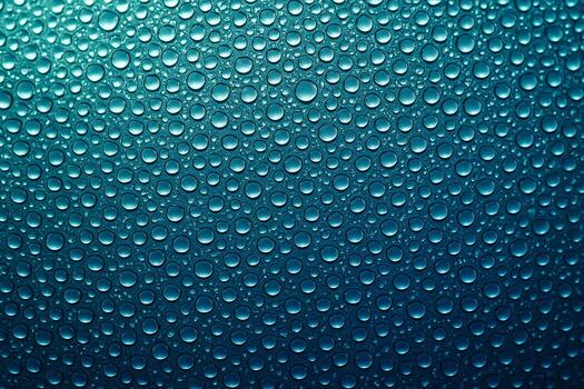 Gradient blue background with evenly distributed small droplets creating a smooth reflective texture. photo
