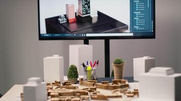 tömma företags- kontor tjänande som ett innovation nav för fast egendom utvecklare, var 3d arkitektonisk programvara, zonindelning efterlevnad, och stad planera strategier guide bostads- projekt. video