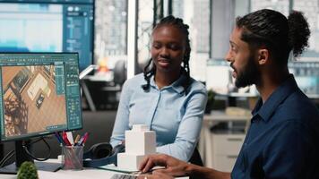 Engineers team using software for measurement and layout planning, using interior design tools for walls structure and floor plan for a new construction in the real estate industry. Camera B. video