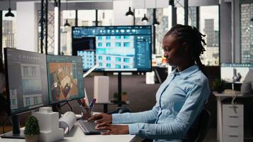 Black female expert works on interior design and walls structure on a software, creating a layout for the property construction project. Infrastructure growth for urban development. Camera A. video