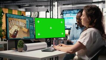 Property developer working with architectural floor plans and mockup display, creating walls structure with measurements and housing designs. Managing residential real estate projects. Camera A. video