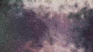Dark moody clouds with soft purple and gray tones and a subtle TV noise texture. Suitable for atmospheric backgrounds, digital art, or mood-enhancing visuals in creative projects. video