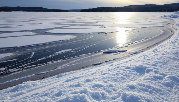 snow blankets the calm lake, delicate undulations, faint icy patterns visible under soft sunlight above. photo