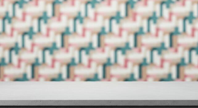 Minimalist concrete tabletop with soft focus abstract teal pink geometric pattern background photo