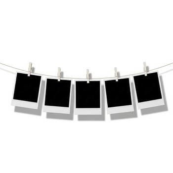 Blank instant photos hanging on a clothesline with clothespins on a white background