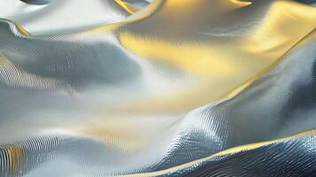 Smooth Silver and Golden Fabric Ripples Gently in Soft, Diffused Light at an Unknown Time video