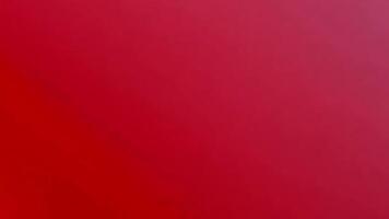 fast röd Färg bakgrund textur med lätt lutning och slät övergång video