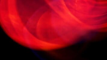 Abstract Motion of Red Light in the Dark Creates Dynamic Colorful Shapes and Curves video