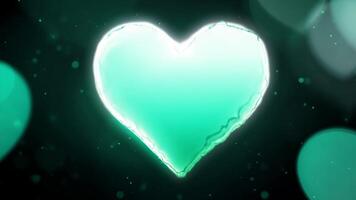 lysande kricka hjärta animering på en mörk bakgrund med gnistrande bokeh effekter video