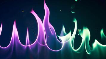 Abstract Colored Flames Emerge Against Dark Backdrop Creating Fluid Dynamic Movement video