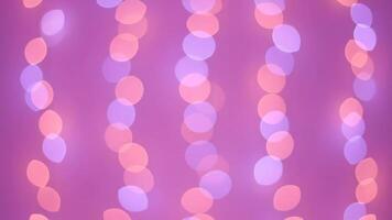 bokeh lichten in roze en Purper creëren een zacht, elegant achtergrond video