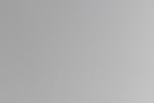 Calm serene background with smooth grey texture suitable material for minimalist house wall. elegant soft gradient creates simple and clean space for any design photo