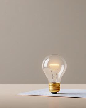 Single glowing lightbulb representing brilliant idea, inspiration, and creativity. concept for innovation, energy, and new solution with feeling of bright hope photo