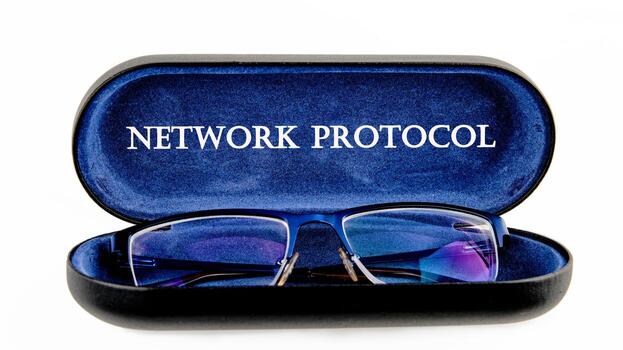 Stylish glasses resting in a protective case feature the text network protocol prominently displayed. This highlights the connection between eyewear and technology innovation photo